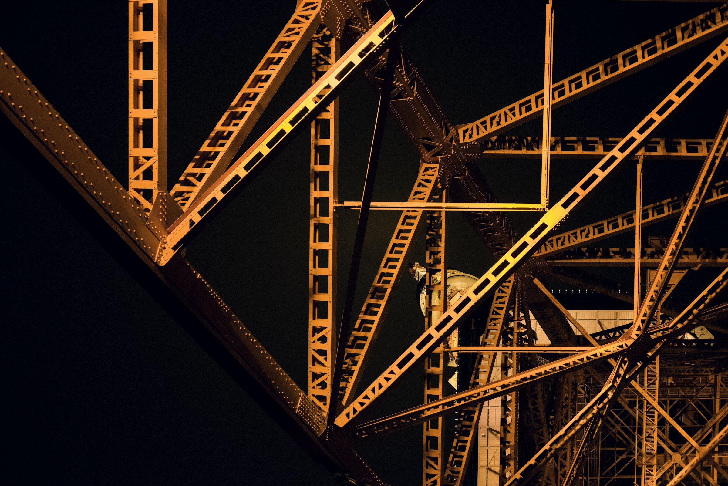 Steel trusses lit at night