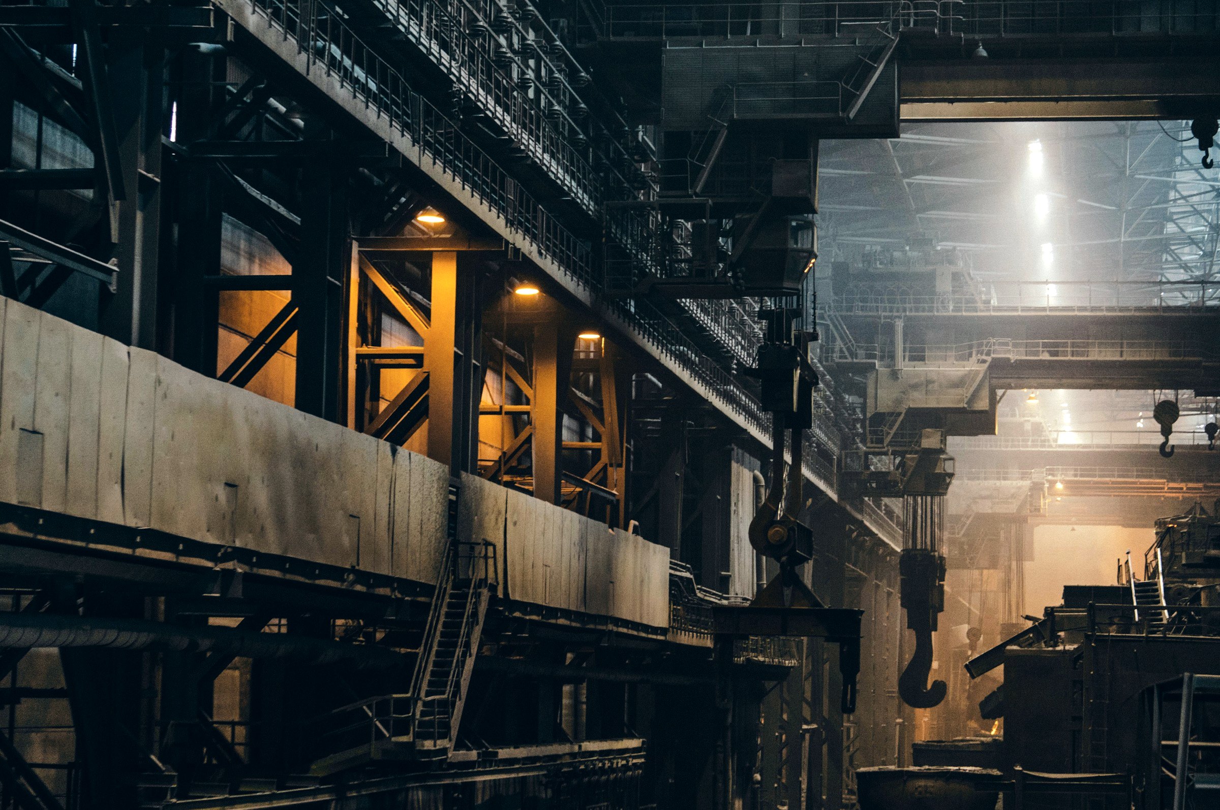 Steel mill interior with heavy machinery