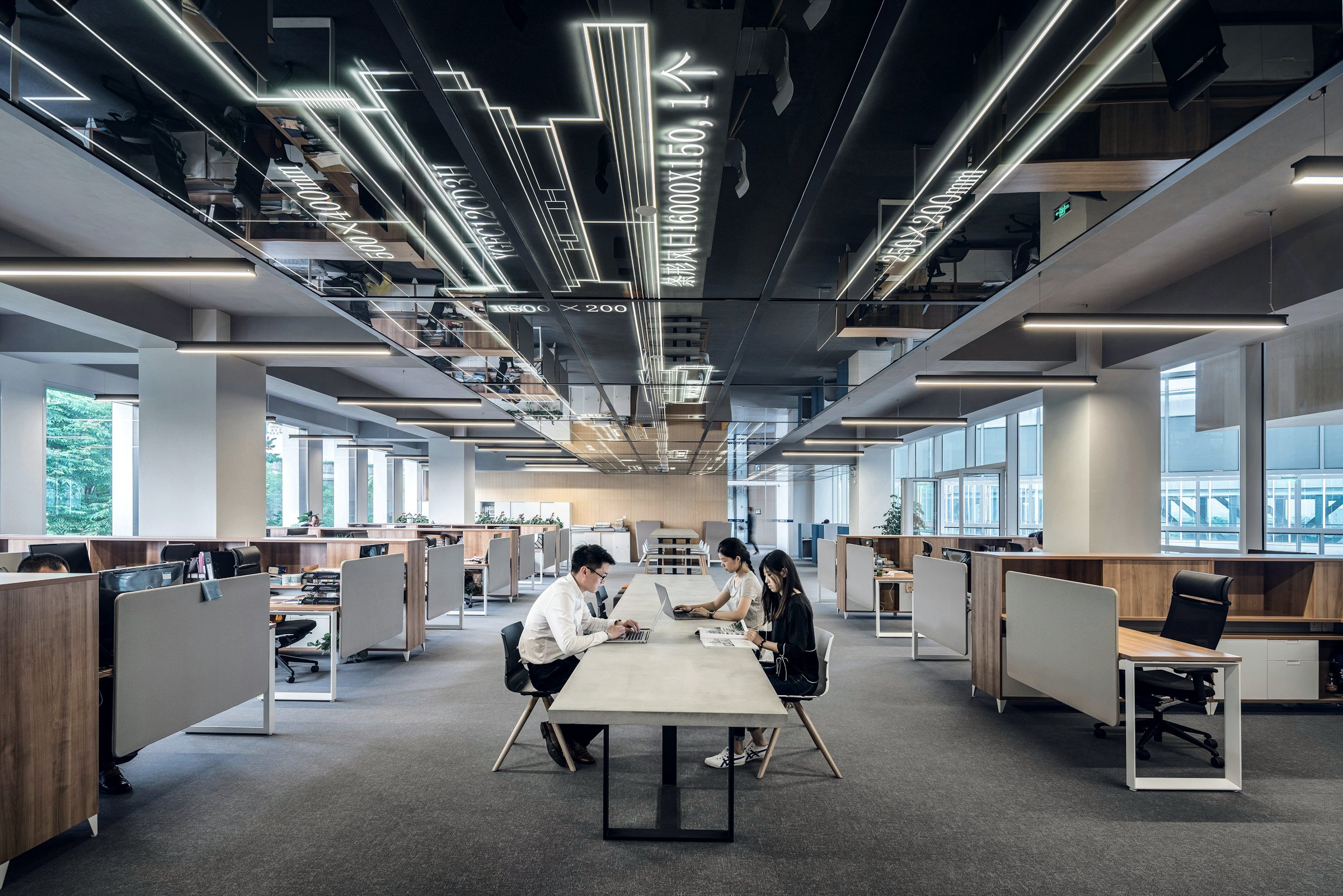 Open-plan office with people working at desks