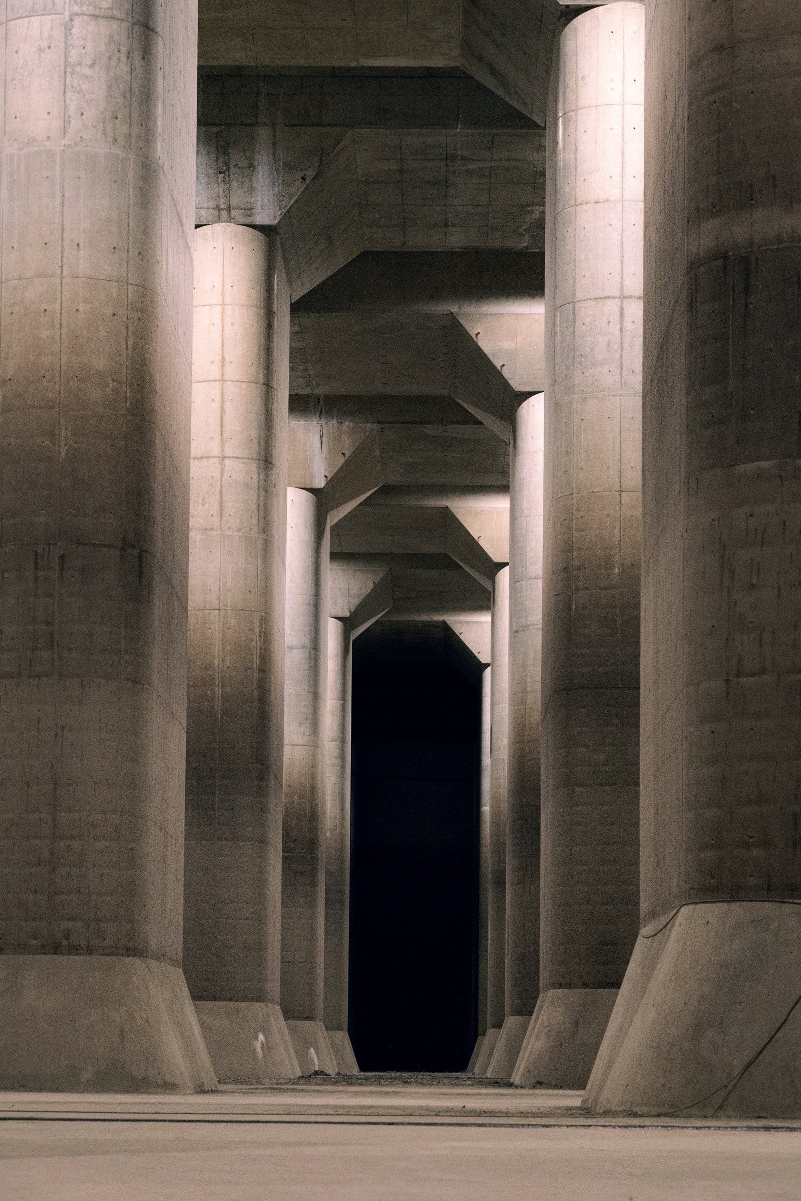 Row of tall concrete pillars